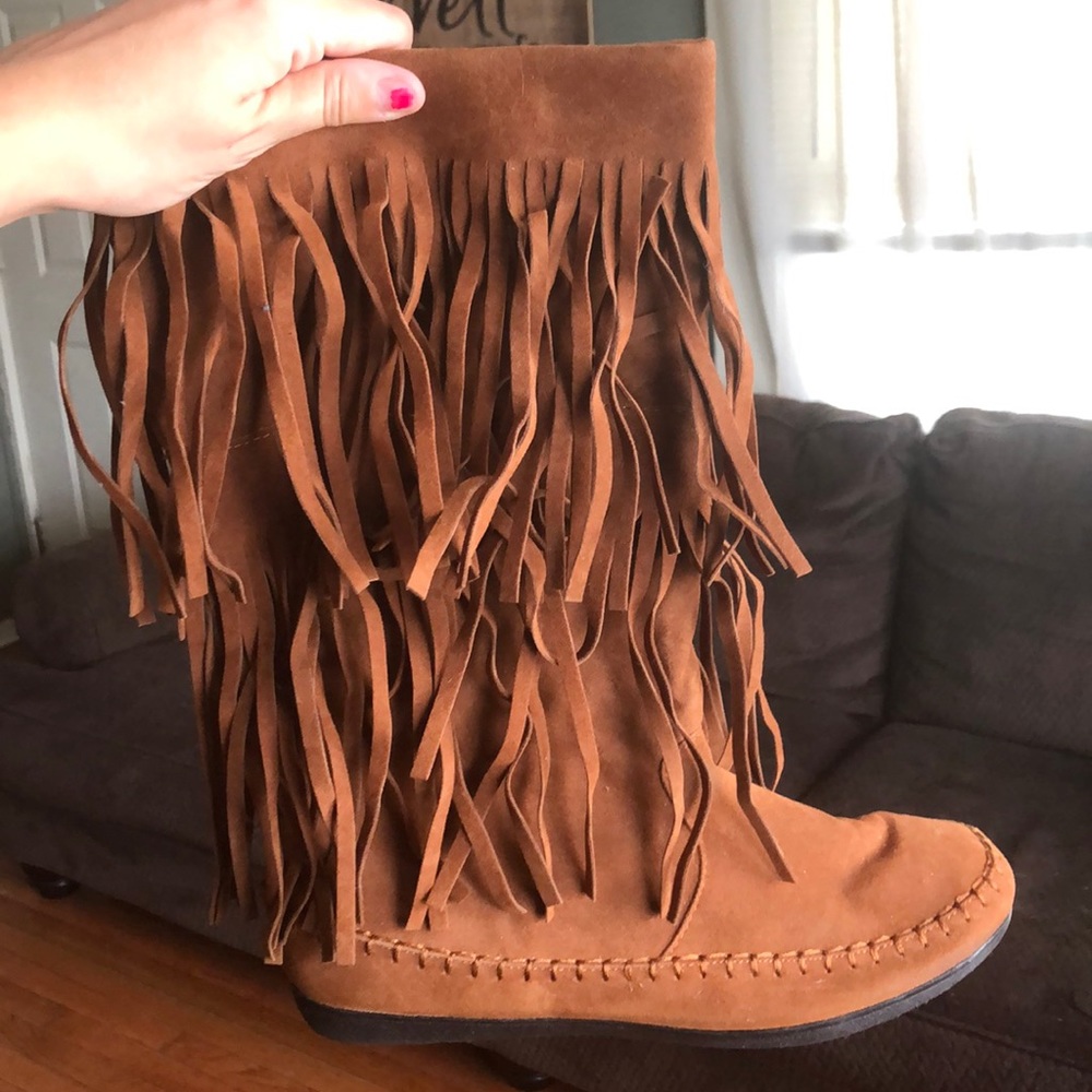 Rampage brown tasseled moccasin boots.